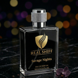 Real Sniff Savage Nights Eau de Parfum 100ml bottle on black marble with orchid flower